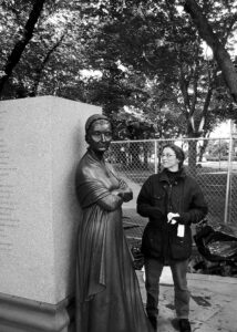 Meredith next to her bronze sculpture of Abigail Adams