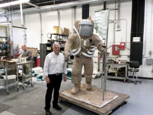 Jack Schmitt in front of astronaut clay original at Bollinger Atelier