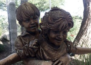 two kids bronze sculpture