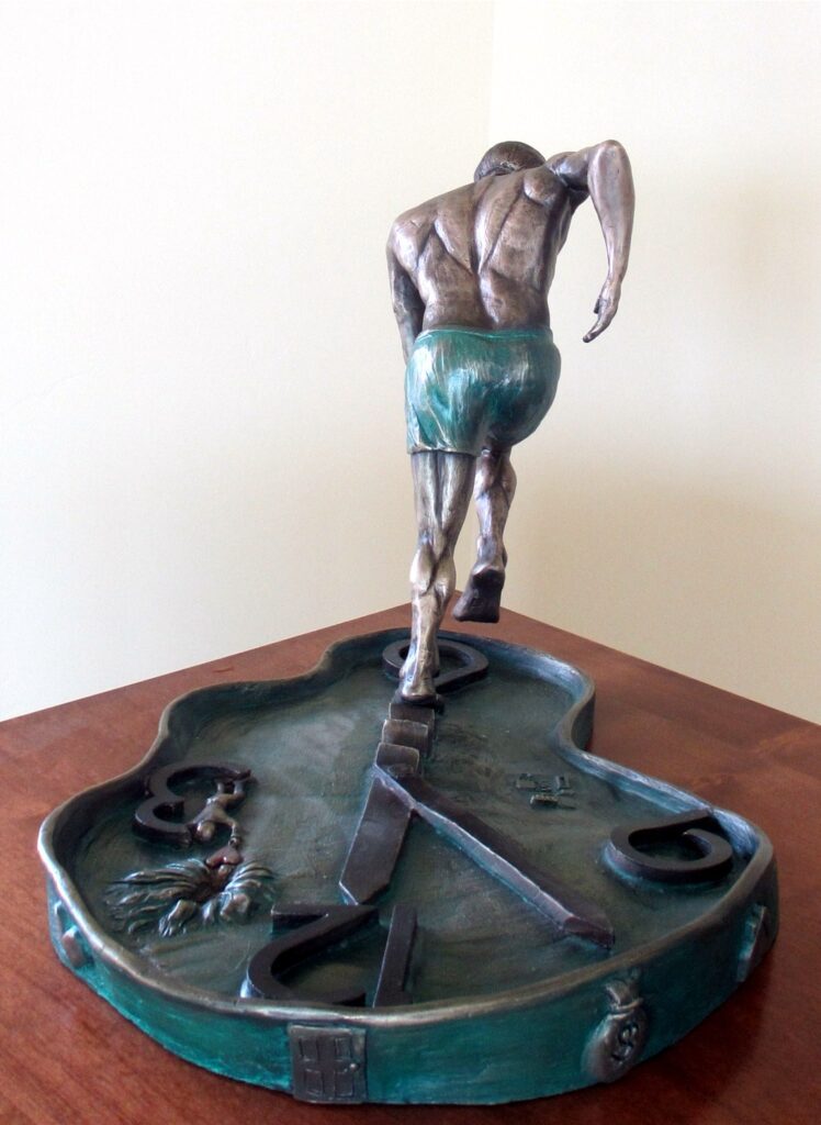 bronze sculpture of a running man