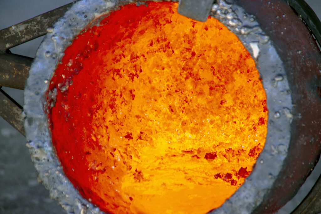 inside a heated crucible making it red hot