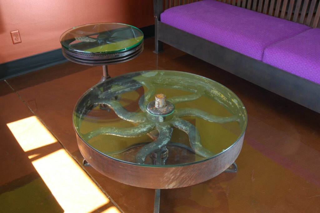 Reclaimed steel found art pulley wheel table